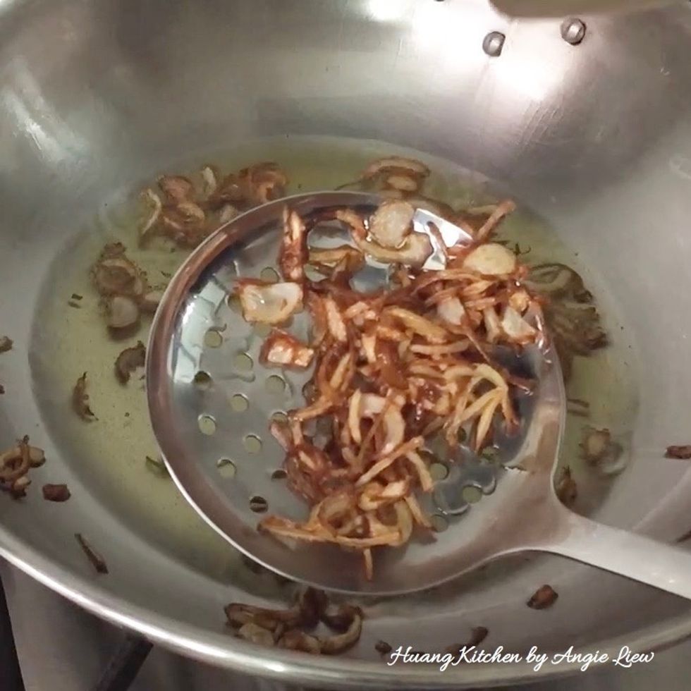 Meanwhile, deep fry the sliced shallots in oil till they turn crispy and golden brown. Set aside to drain on paper towel.