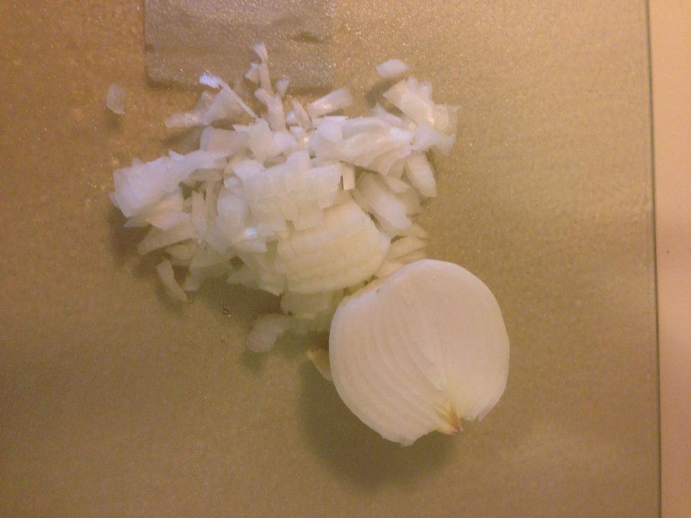 Meanwhile, finely chop 1 yellow onion....