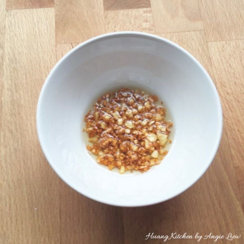 Meanwhile, fry minced garlic till golden brown in oil and set aside.
