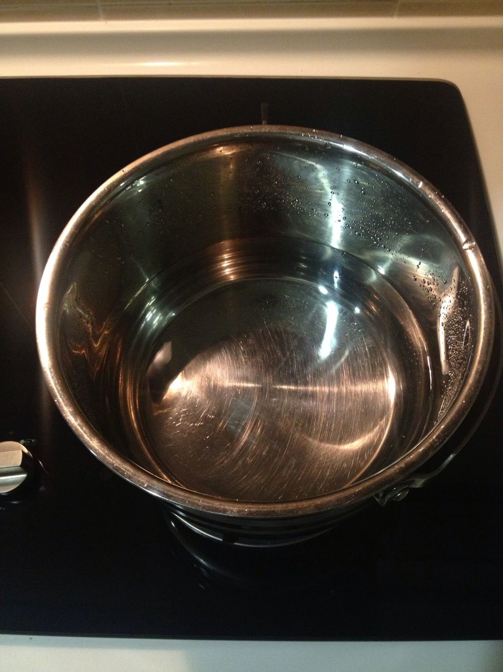 Meanwhile frying the shallots, bring a pot of water to boil. Not too much. Just enough to cover the chicken. You can always add later.