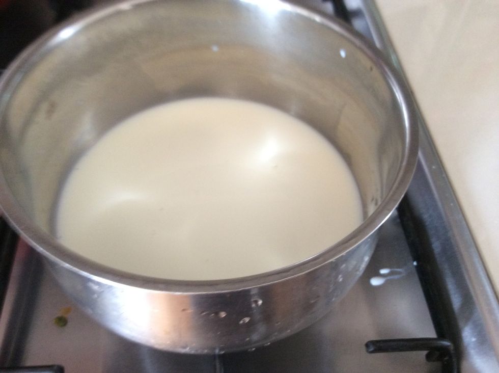 Meanwhile, heat milk in a saucepan over medium-low heat until just boiling.