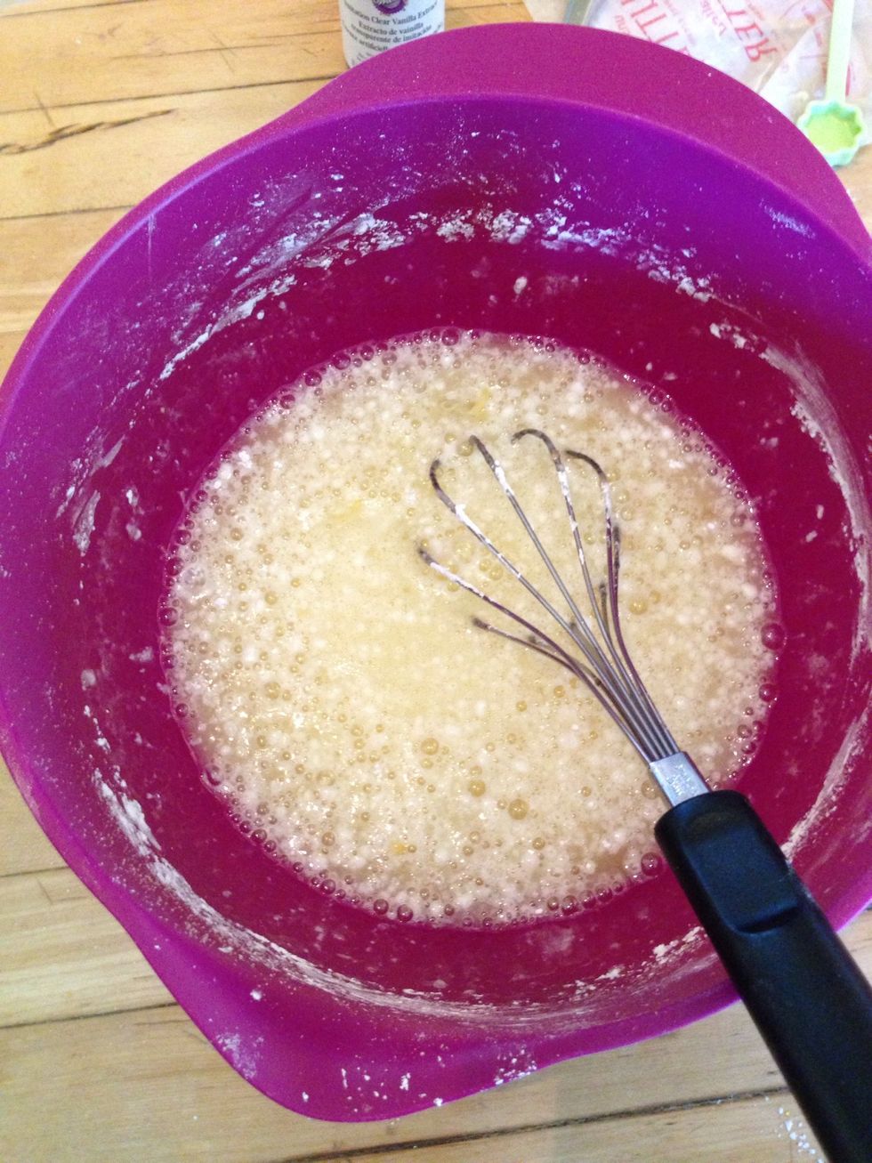 Meanwhile.. In a medium bowl, mix egg and egg whites until fully blended, then add vanilla extract and 3/4 cup powdered sugar and mix well.