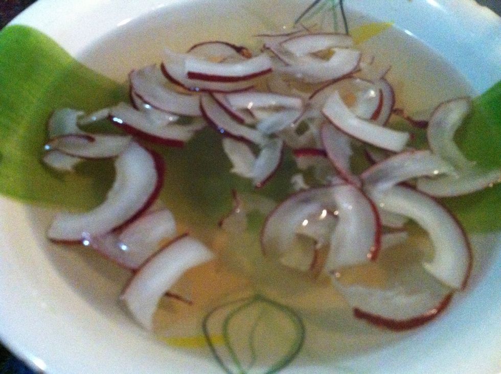 meanwhile in sugar syrup add dried coconut