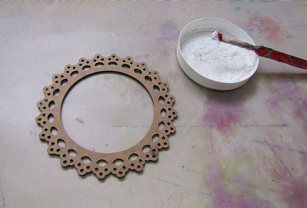 Meanwhile, paint the frame with gesso. This beautiful frame is from Melissa Frances.