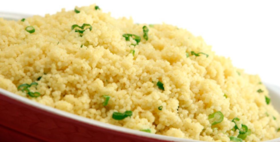 Meanwhile, place the couscous in a large bowl. Add 1 cup of hot tap water, cover, and let sit for 5 minutes. Fluff with a fork. Serve with the stew.