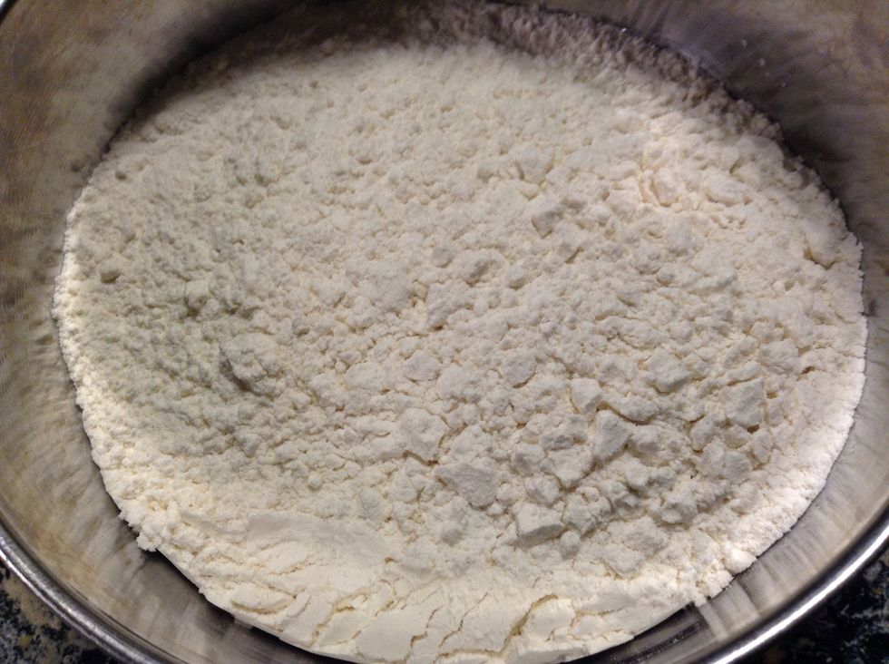 Meanwhile, put flour in separate bowl (dry ingredients)