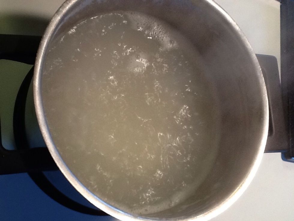 Meanwhile rinse rice and boil in salted water. Boil for 10minutes. Remove and drain water, set aside.