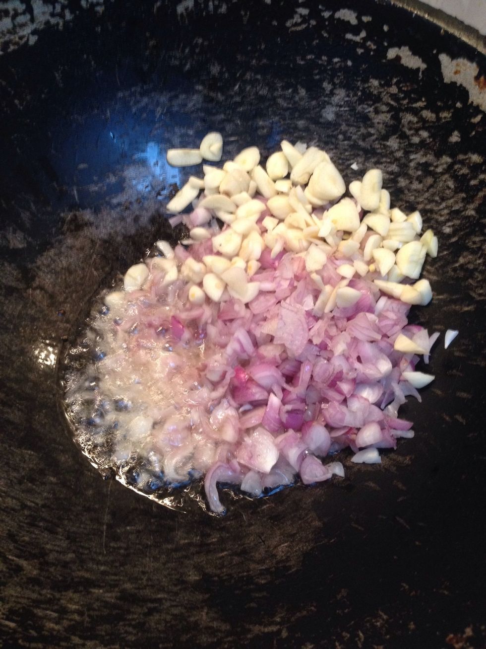 Meanwhile saut\u00e9e few finely chopped shallots and garlic until the raw smell goes off