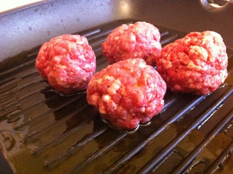Meanwhile, shape meat into meatballs and fry for about 3 minutes on each side.
