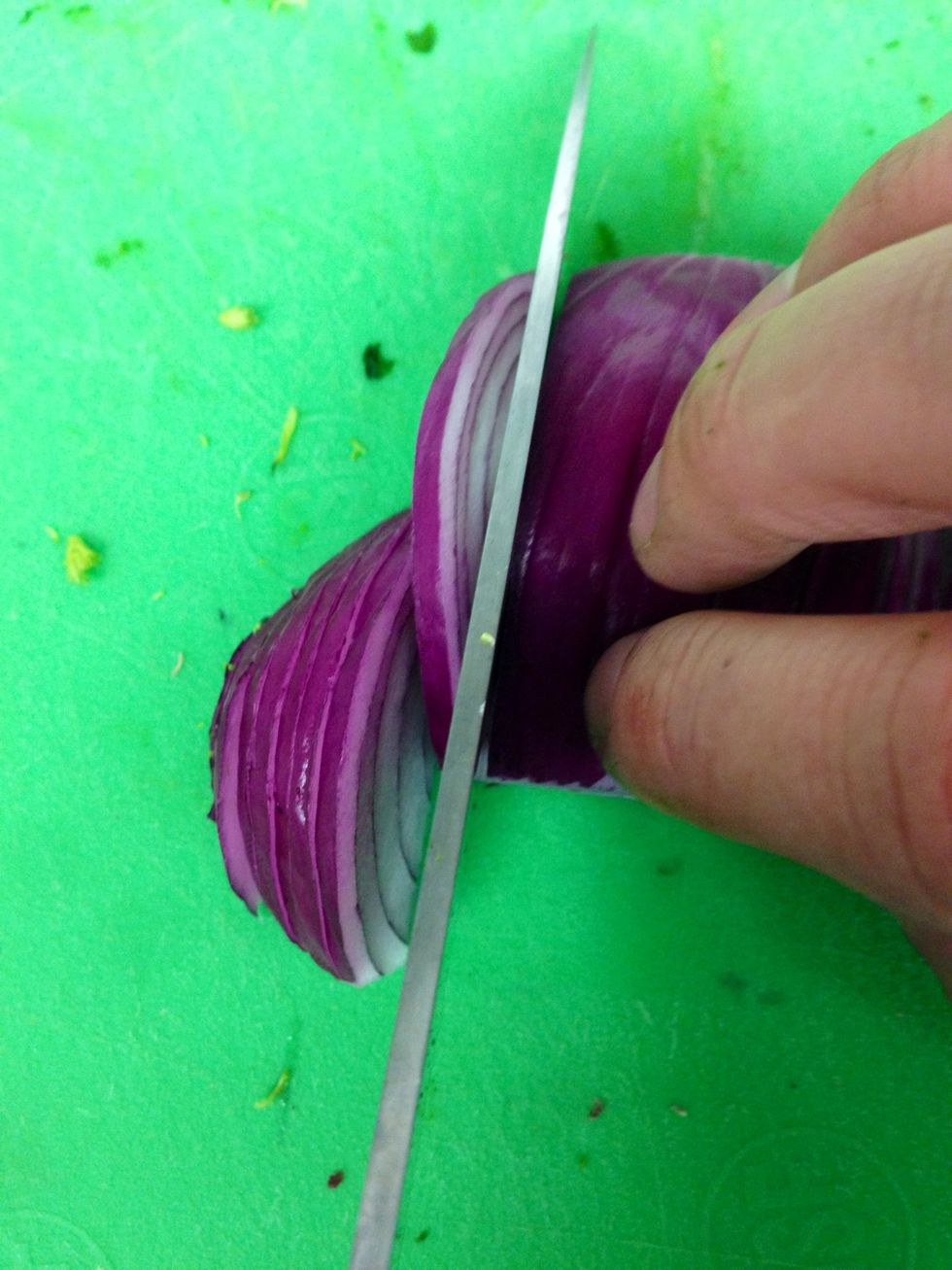 Meanwhile, thinly slice the red onion.