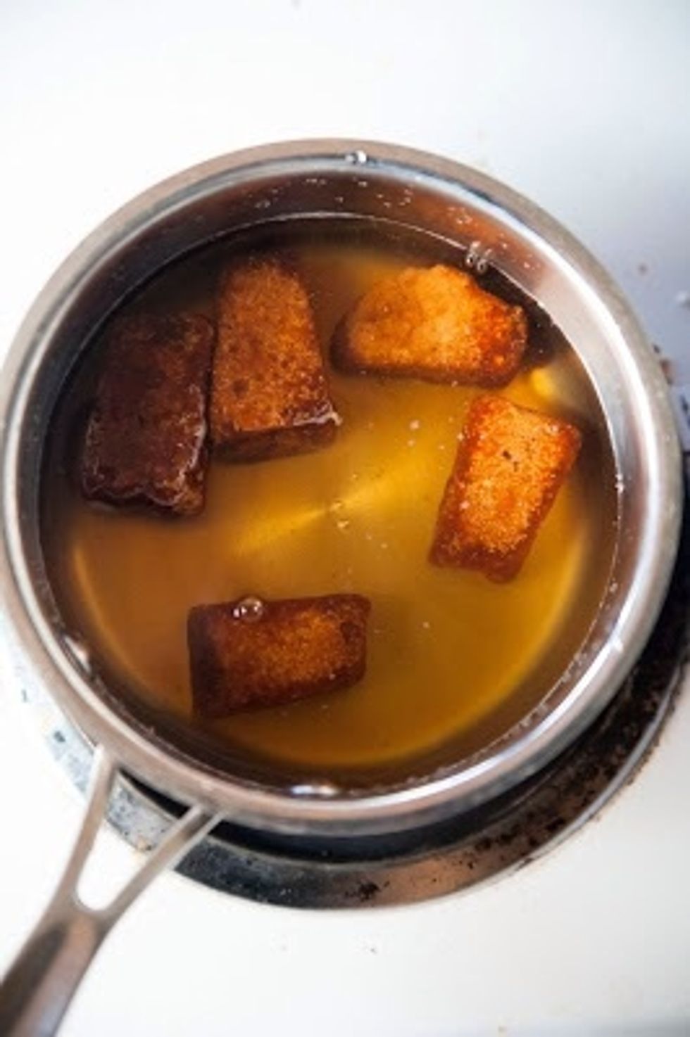Meanwhile while that is going on: Soak the jaggery or brown sugar in warm water. The water should just cover the sugar, in other words not too much.