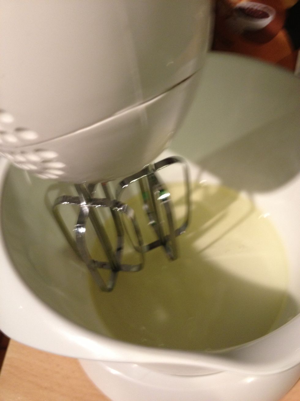Meanwhile whisk egg whites until soft peaks form.
