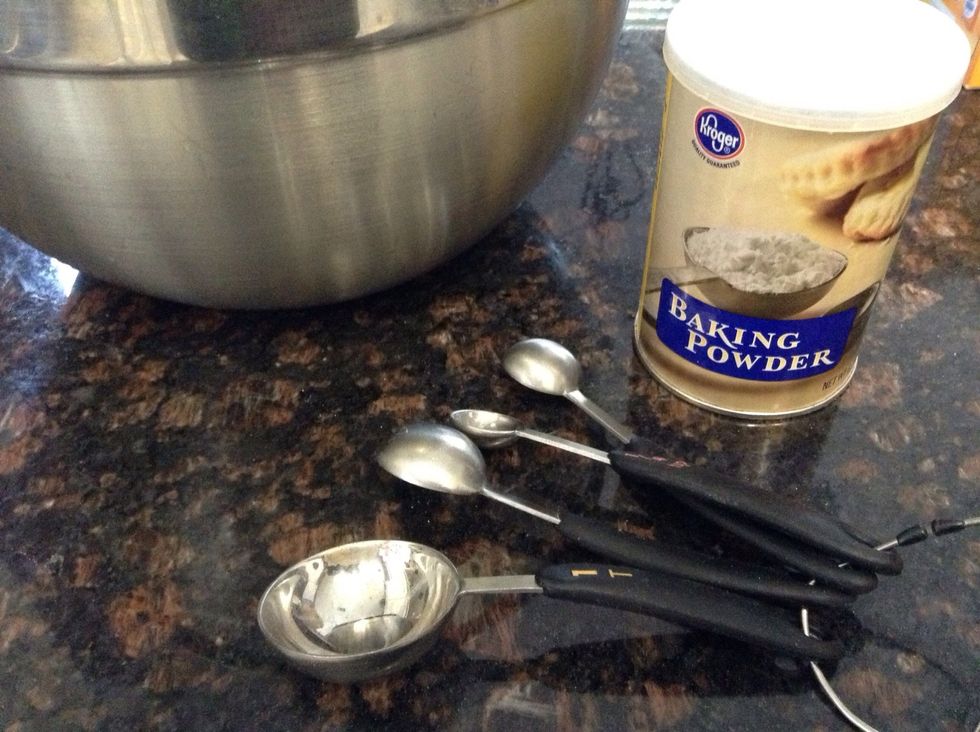 Measure 1 1/4 tsp baking powder and add to dry ingredients.