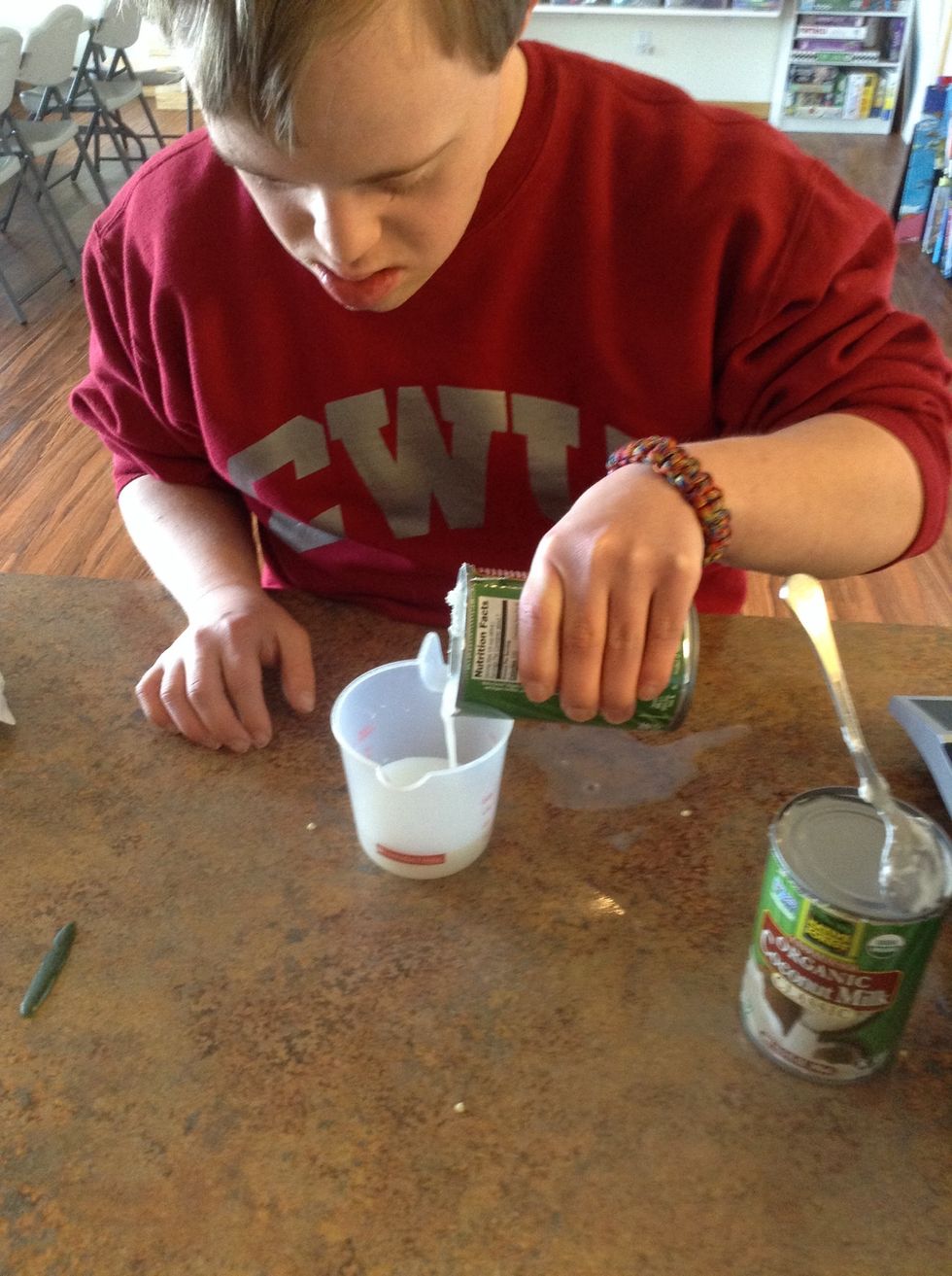 Measure 1/2 cup coconut milk