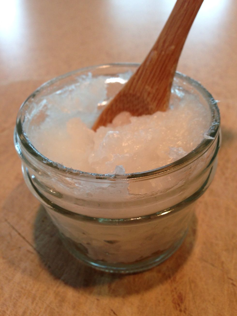 Measure 1/2 of a cup of coconut oil & transfer to a mixing bowl.