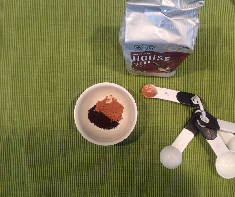 Measure 1/2 teaspoon coffee grounds and add to bowl with cocoa.