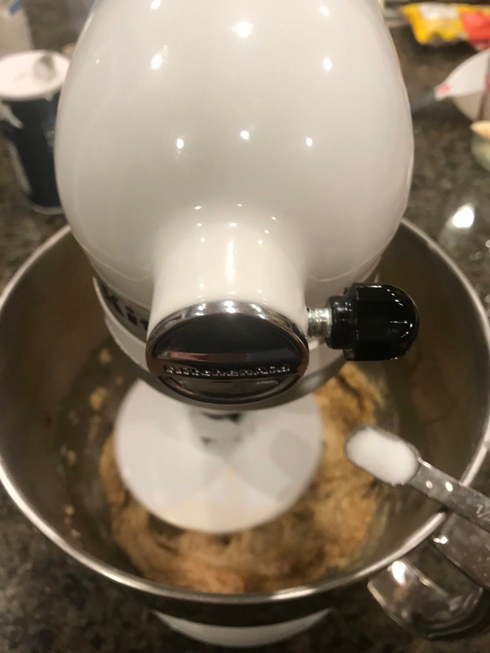 Measure 1/2 teaspoon of salt and then add it to the dough to create the sweet and salty flavor of the cookie.