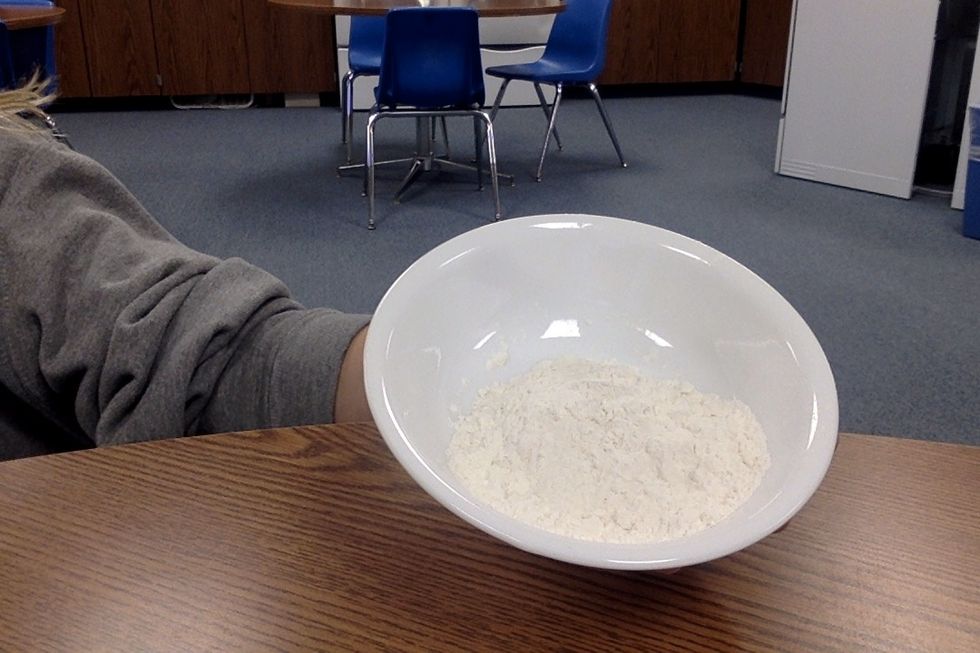 Measure 1/4 cup of flour.