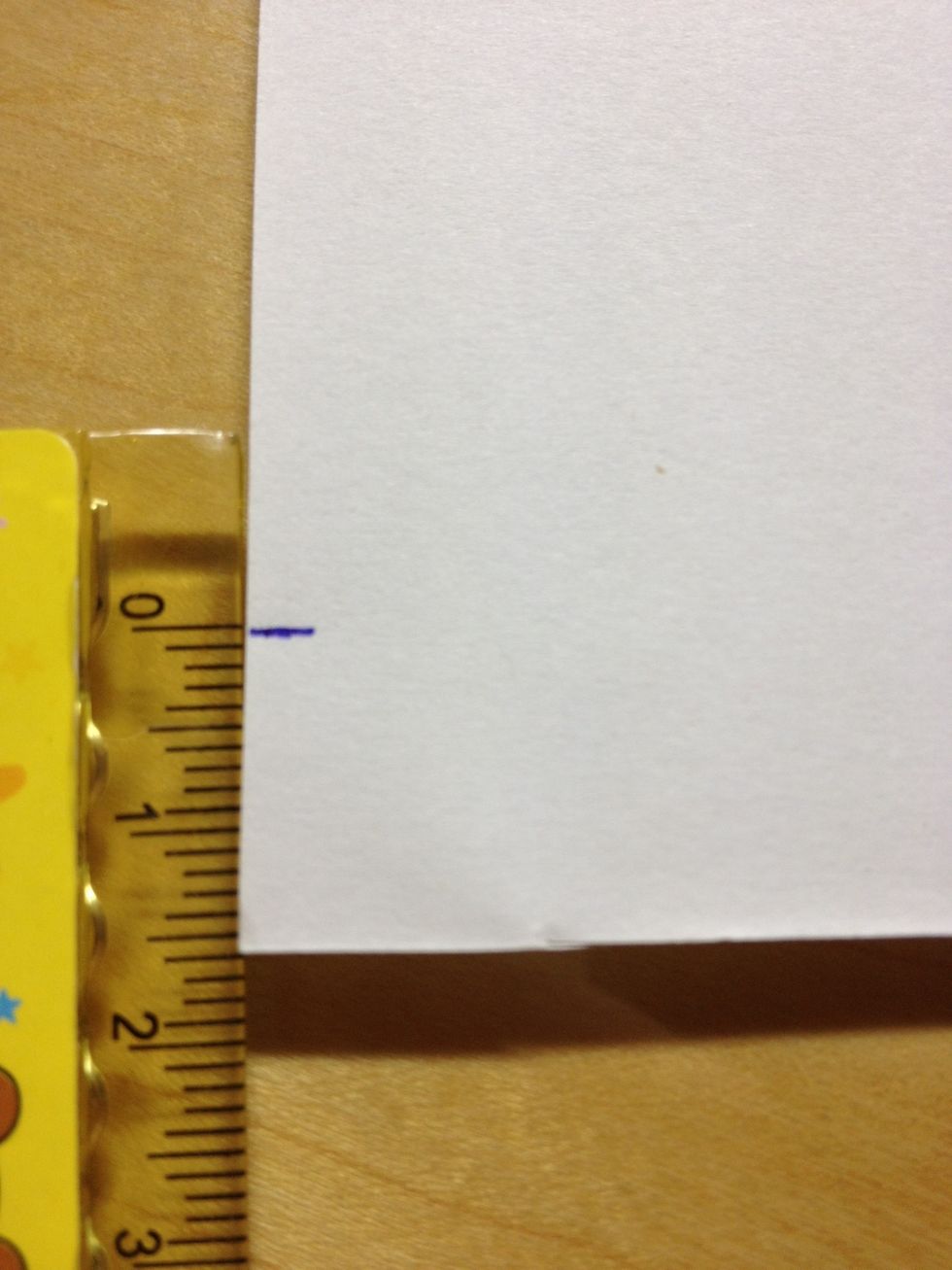 Measure 1.5 cm at both side of the paper