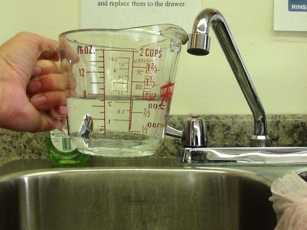 Measure 1 cup of hot water
