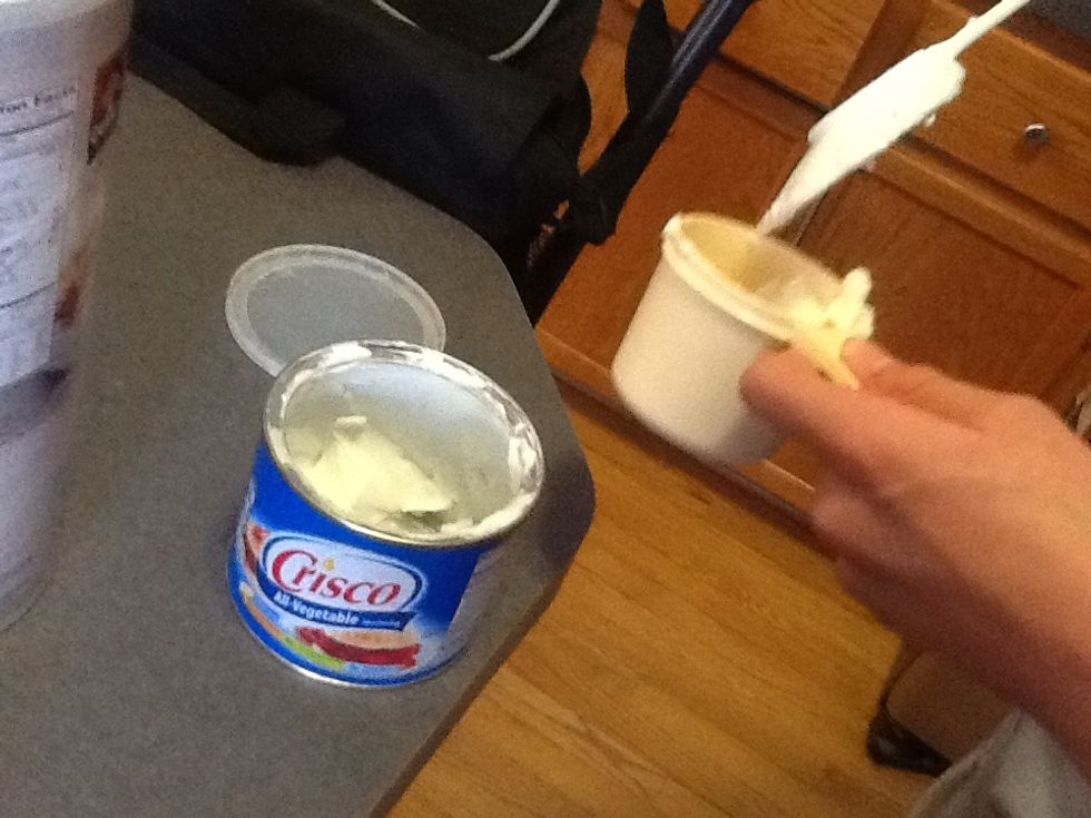 Measure 1 cup of shortening and cream with sugar. Then add to mixing bowl.