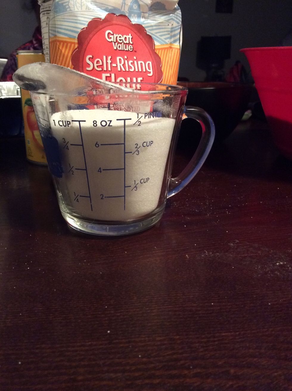Measure 1 cup of sugar