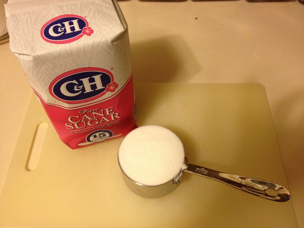 Measure 1 cup of sugar.