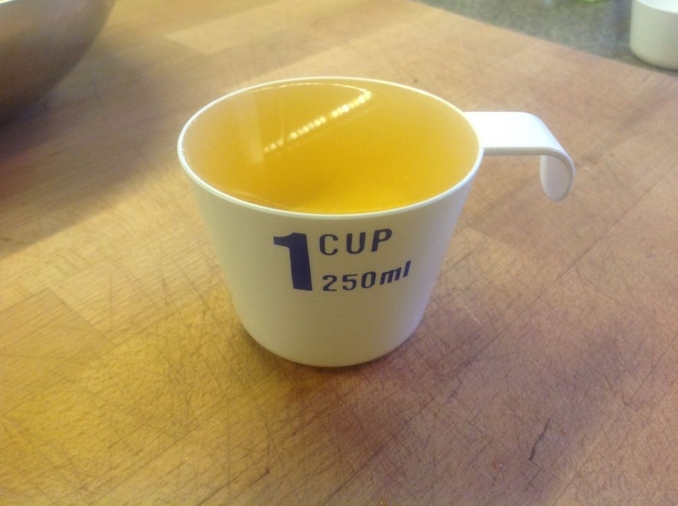 Measure 1 cup of white wine vinegar or vinegar of your choice