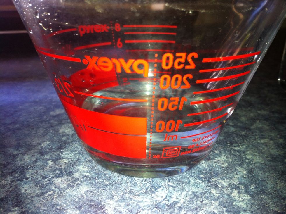 Measure 1cup lukewarm water for the yeast solution. I am using yeast as an alternative to toddy (alcoholic coconut juice), which is traditionally used as a raising agent.