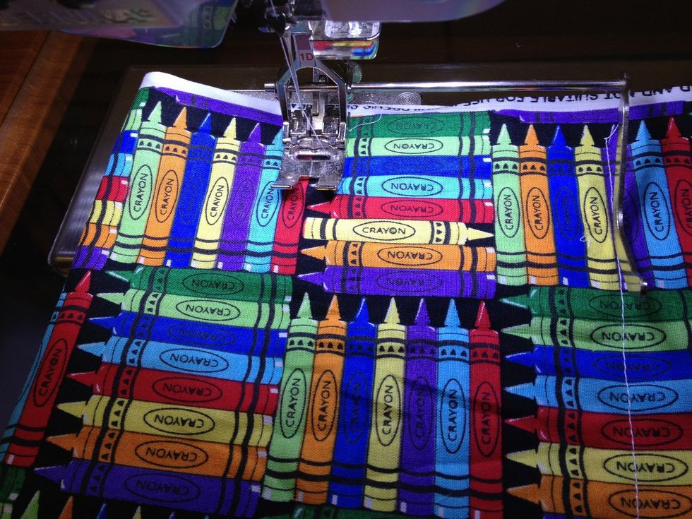 Measure 2 and 3/4 inches from the line if stitching.   Sew