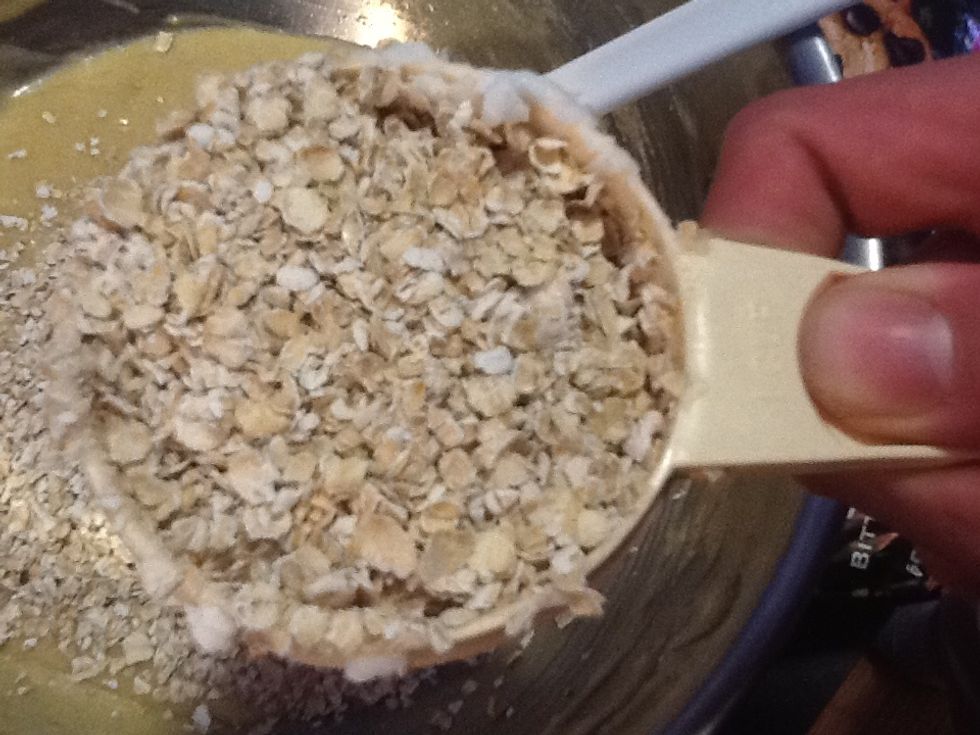 Measure 2 cups of quick cook oatmeal, and stir into the mixing bowl.