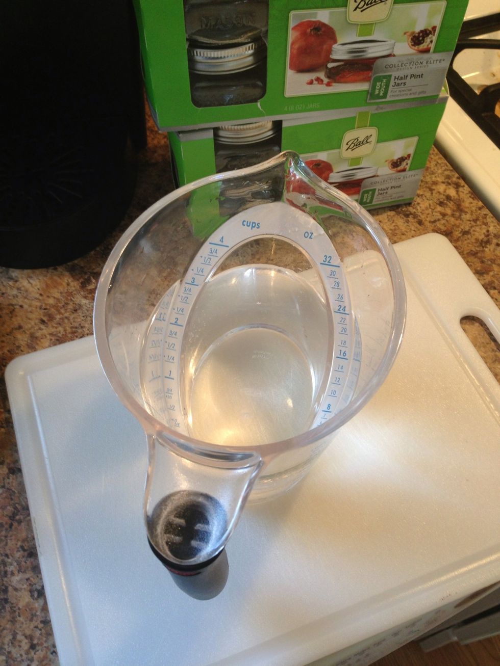 Measure 2 cups water 1 cup white vinegar and add to a medium sized pot.