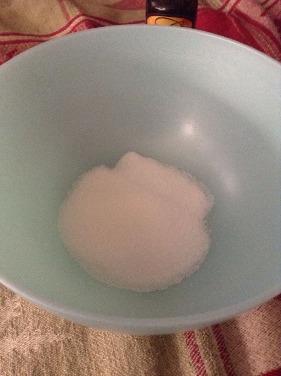 Measure 2 teaspoons sugar and put them in the bowl.