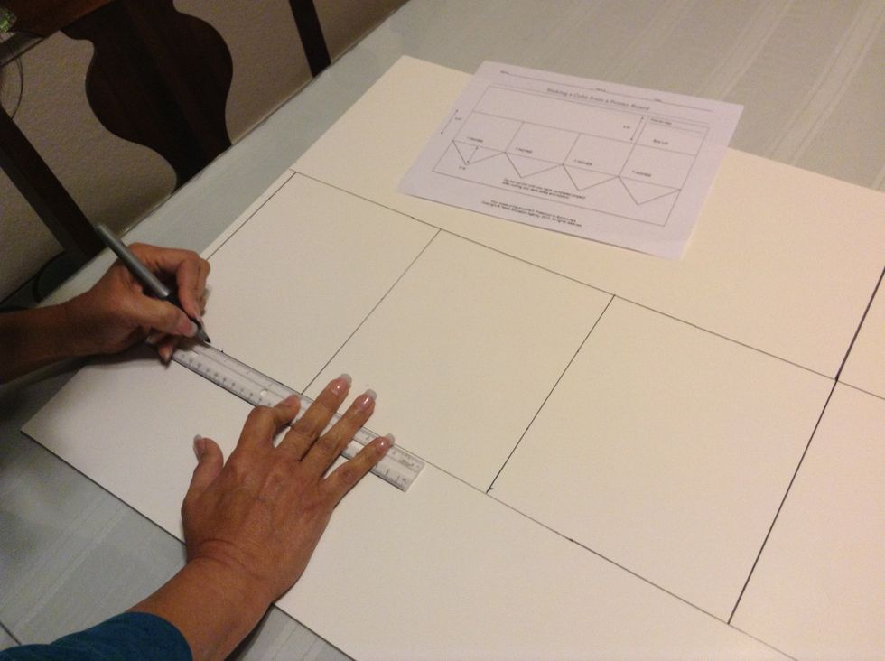 Measure 3 1/2 inches to mark the center point.