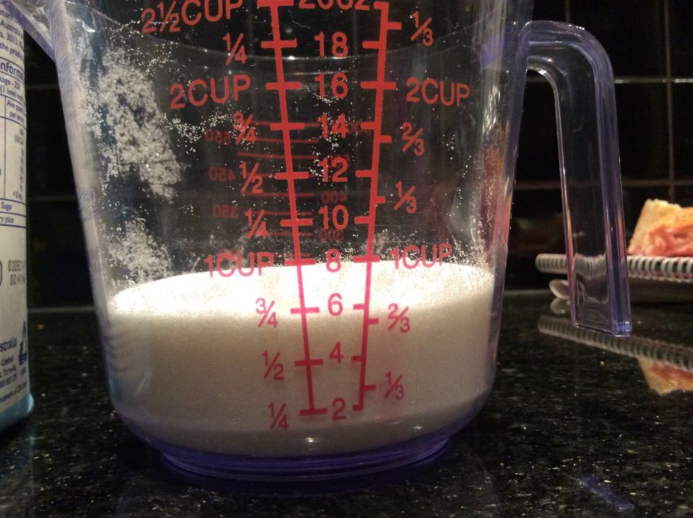 Measure 3/4 of a cup of caster sugar