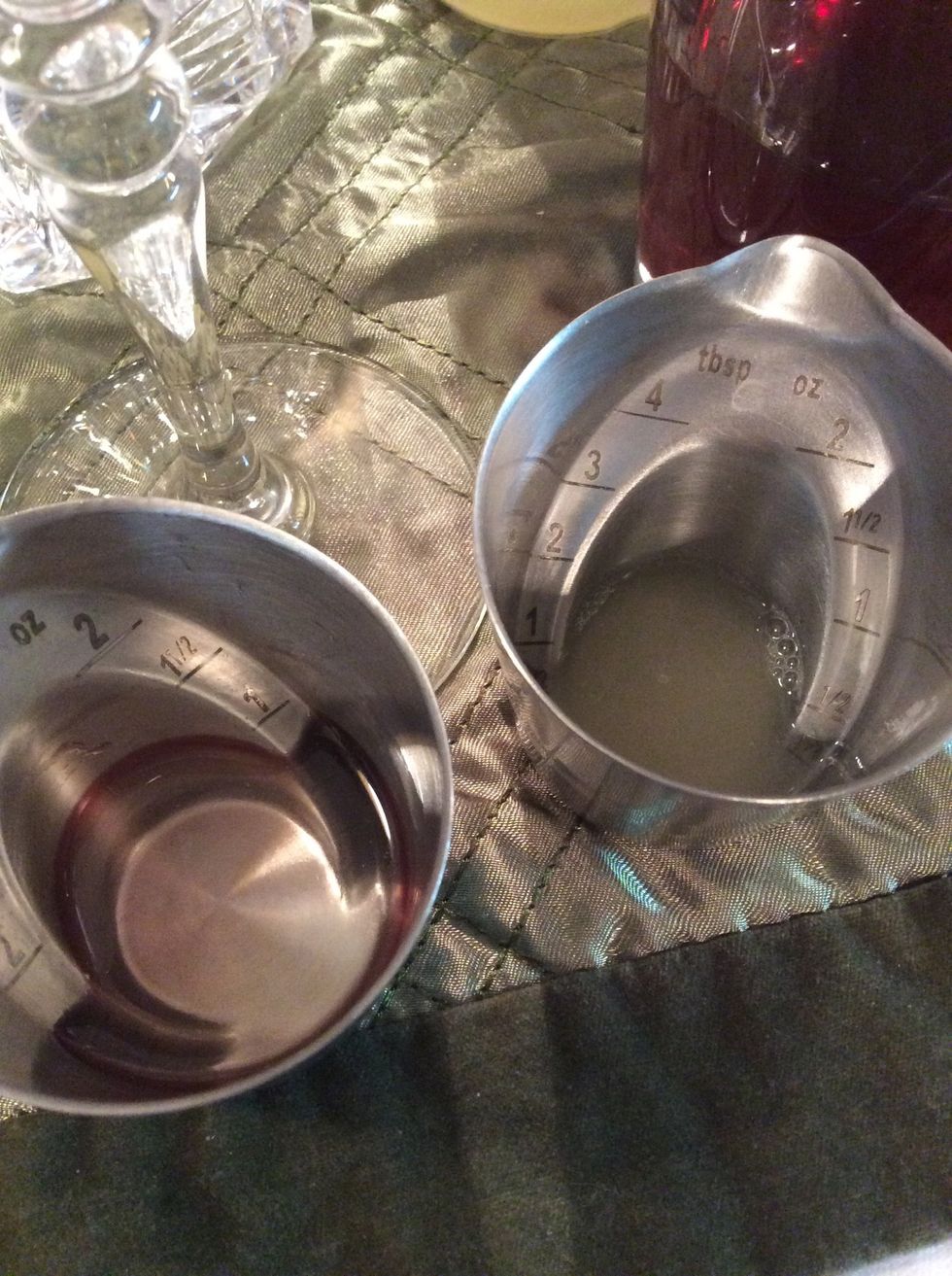 Measure 3/4 ounce simple syrup and 1/4 ounce fresh squeezed lime juice.