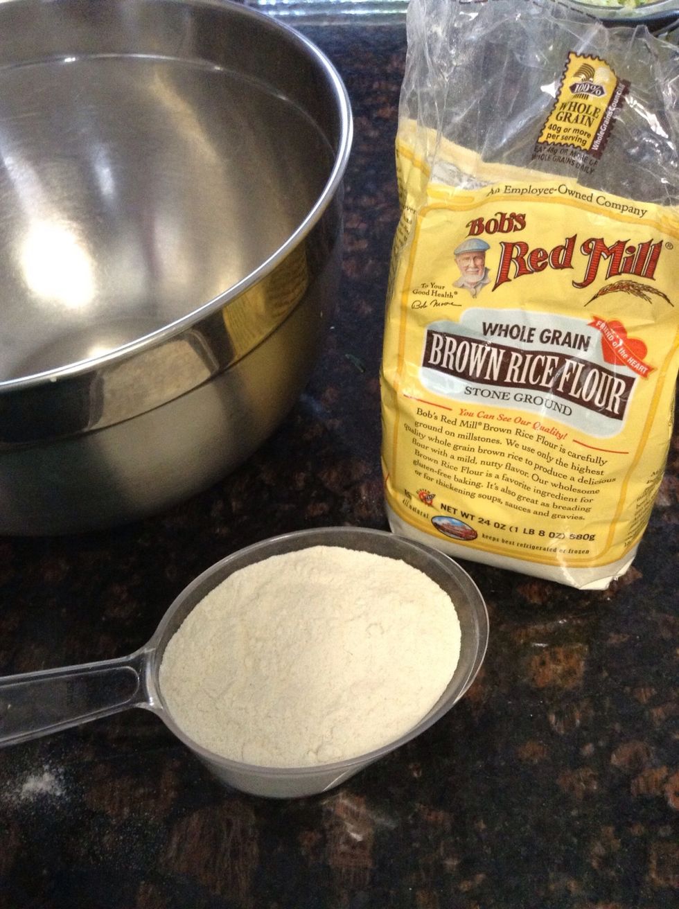 Measure 3 cups brown rice flour and add to large mixing bowl.