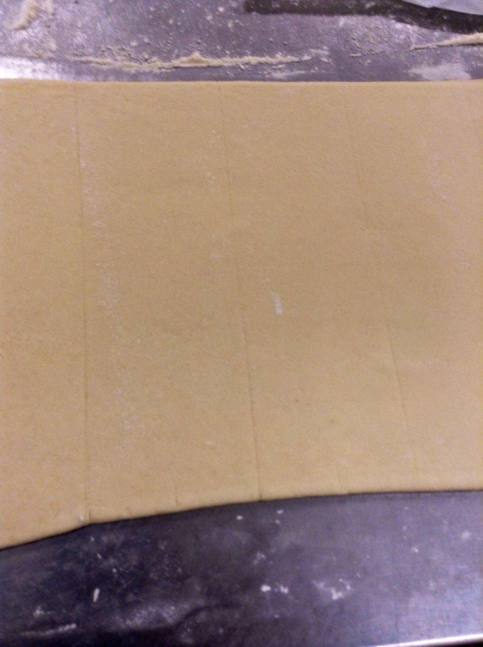 Measure 3 or 4 inches and indent the dough from top to bottom with knife as shown in photo!