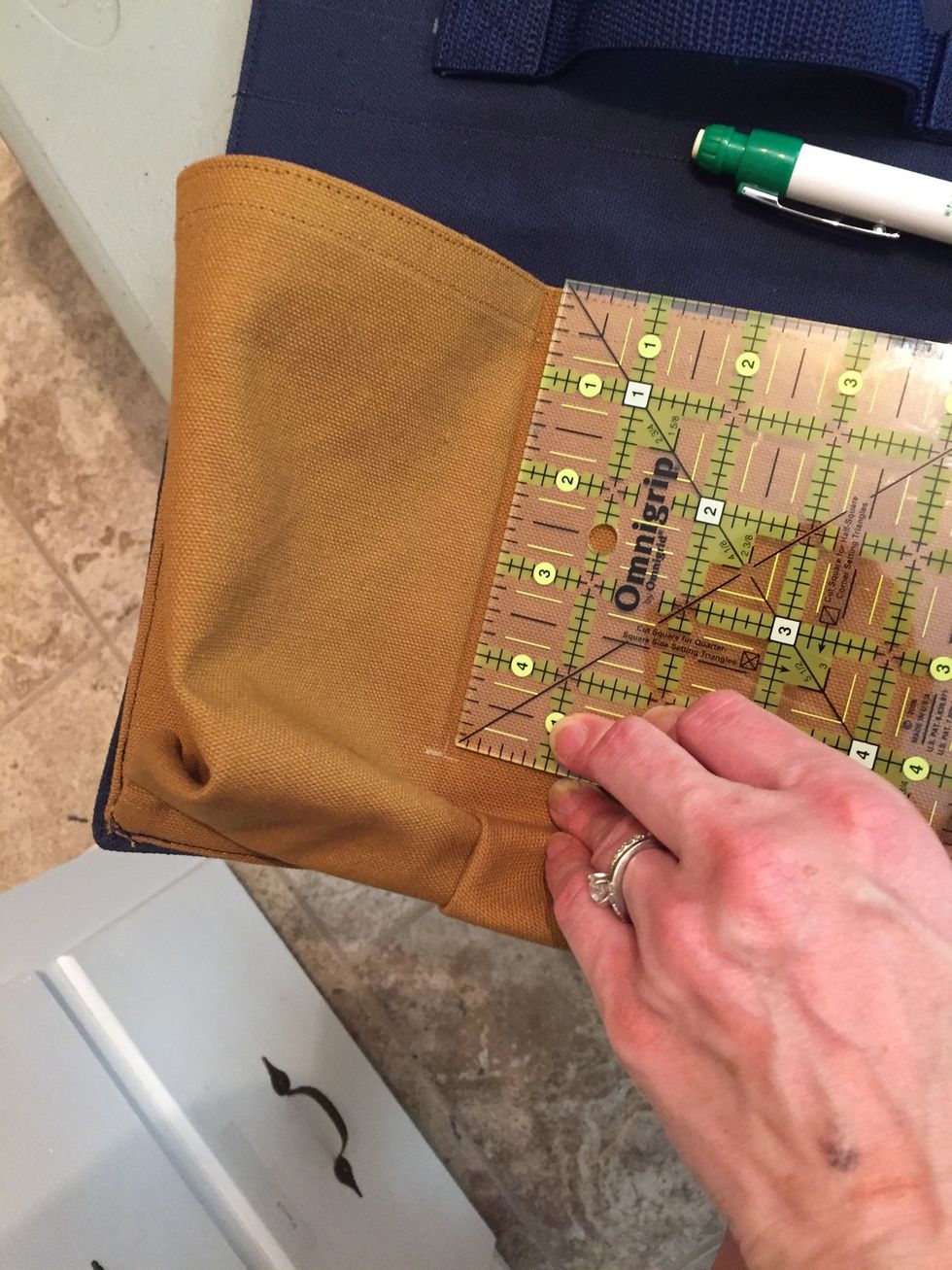 Measure 4" down pleat of holder and mark.