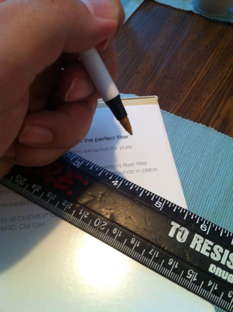 Measure 5 1/2 inches from the top corner to the front. Do this for both sides.