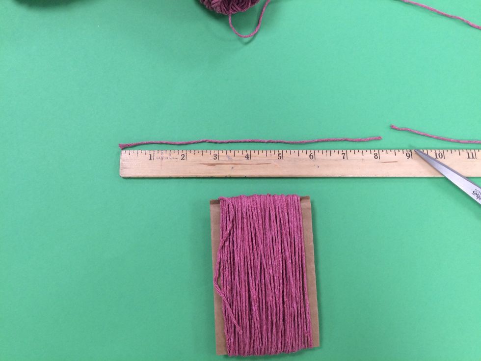 Measure 8" of yarn and cut.