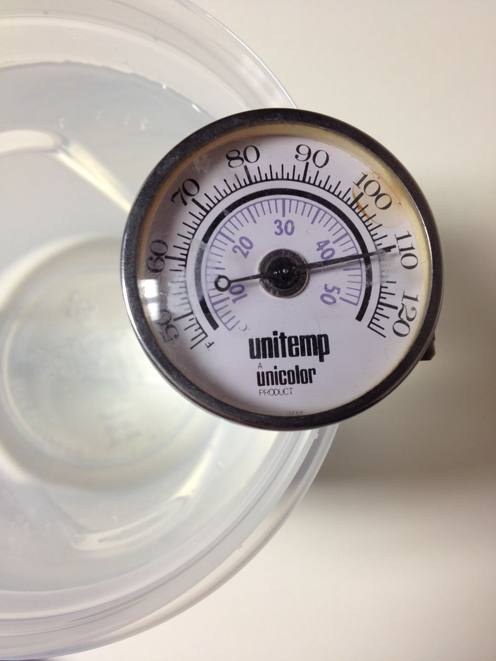 Measure 800ml of 110\u00b0F distilled water. Pour this into a 1gal mixing pitcher.