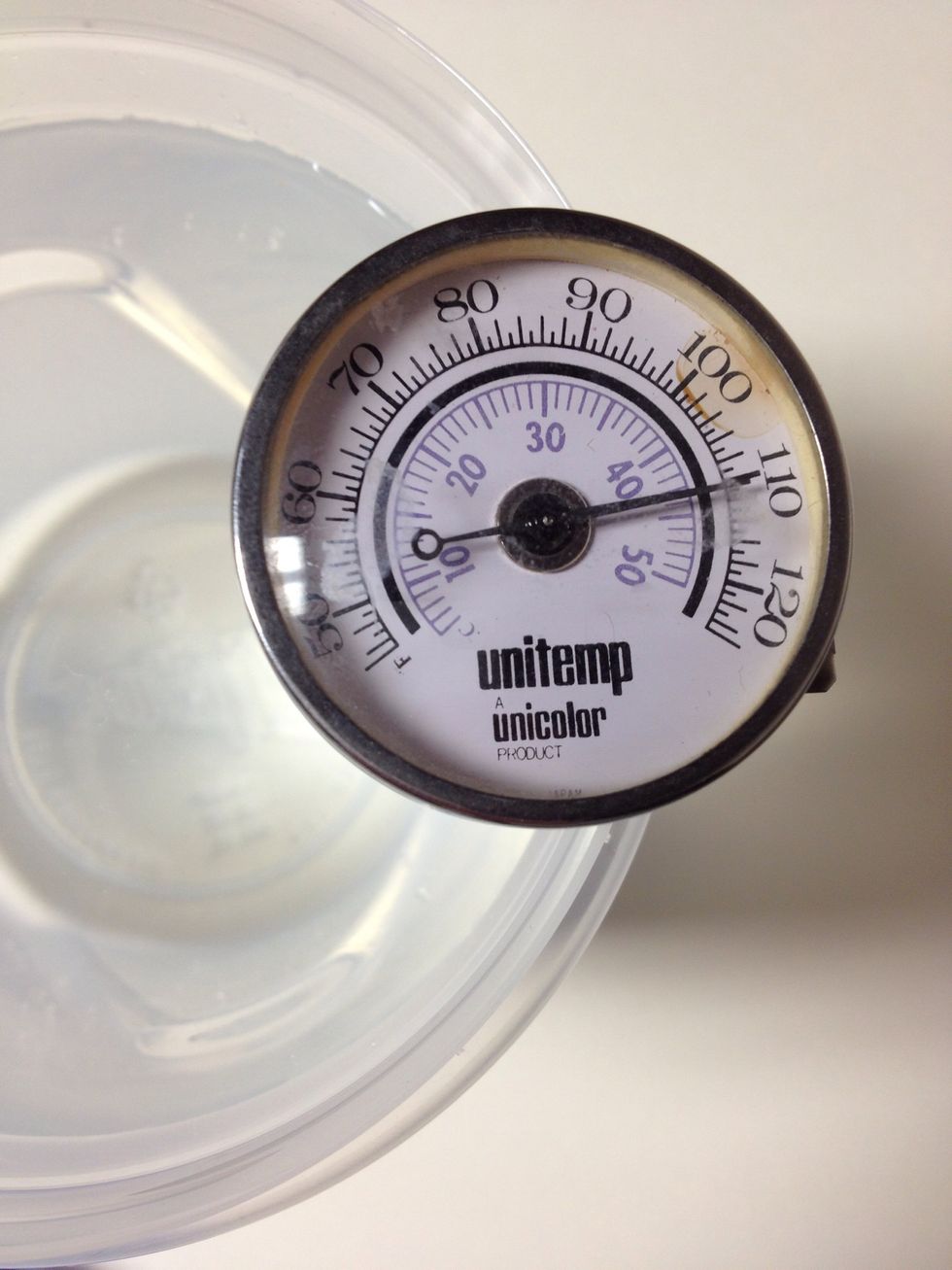 Measure 800ml of 110\u00b0F distilled water. Pour this into a 1gal mixing pitcher.