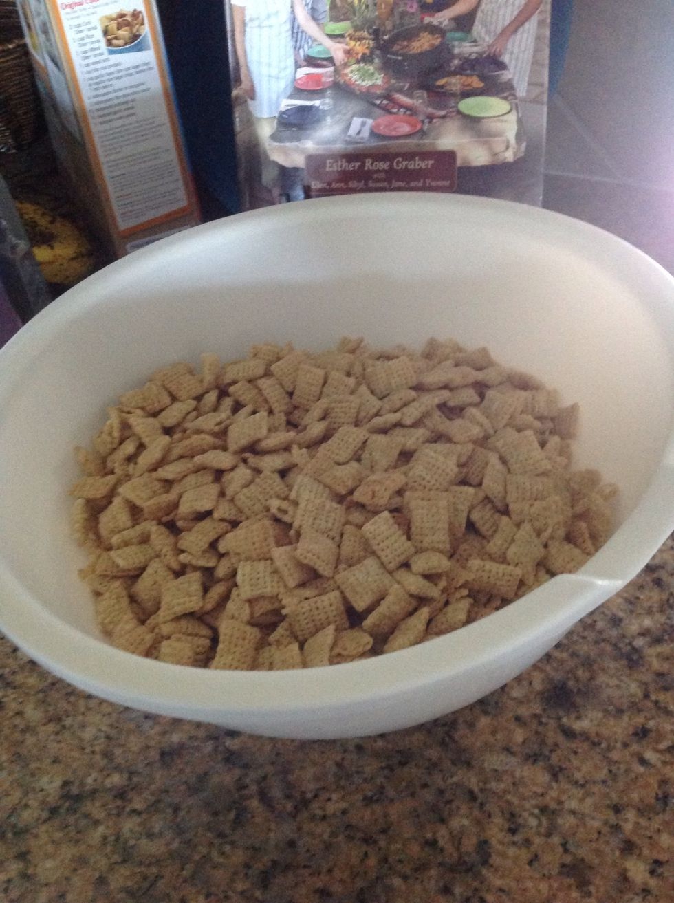Measure 9 cups of Rice Chex into your mixing bowl.