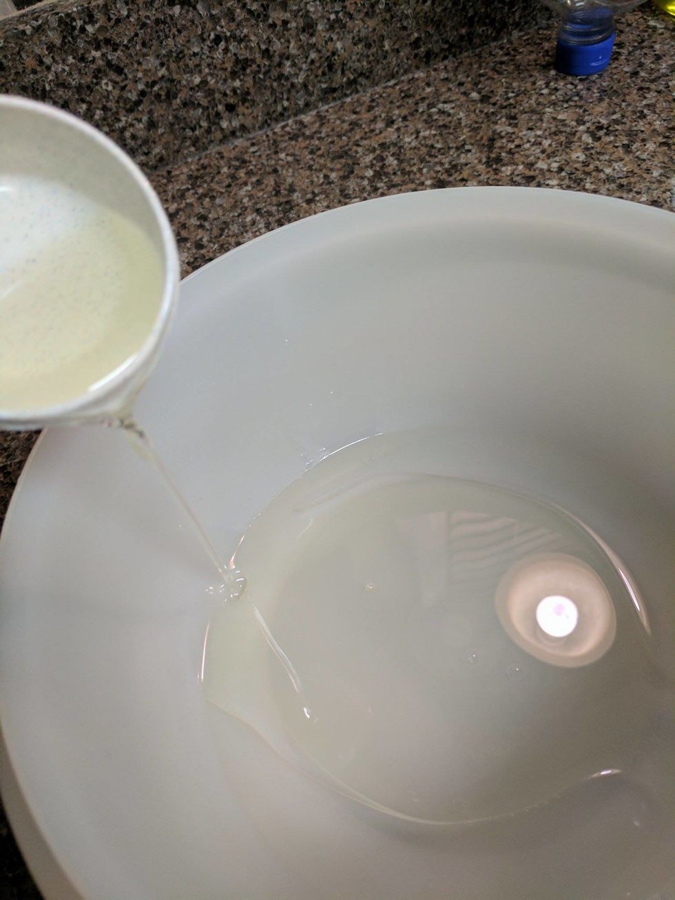 Measure a 1/2 cup of vegetable oil and pour into the mixing bowl.