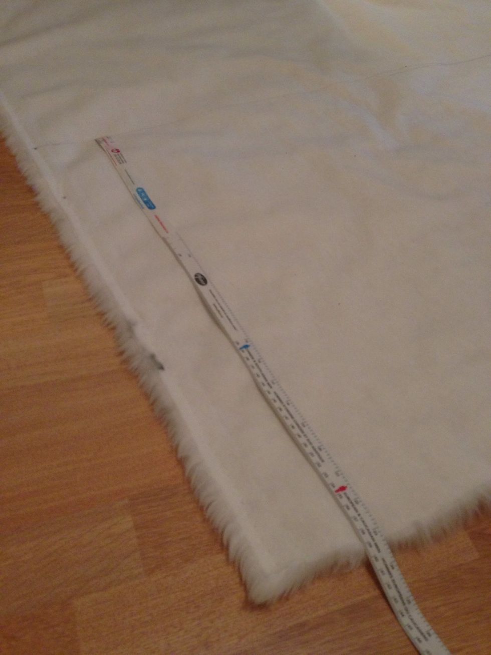 Measure a 24" inch width of fabric. The chair is 17.5" so this will leave a bit on both ends to work with as a seam.