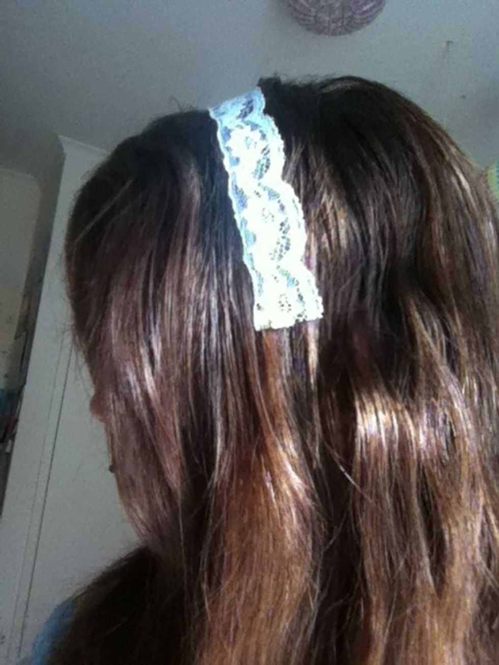 Measure a piece of ribbon by sitting the ends on the tips of your ears on both sides