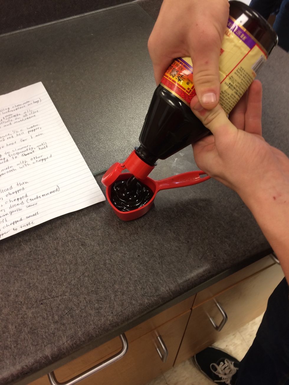 Measure a quarter cup of black bean garlic sauce
