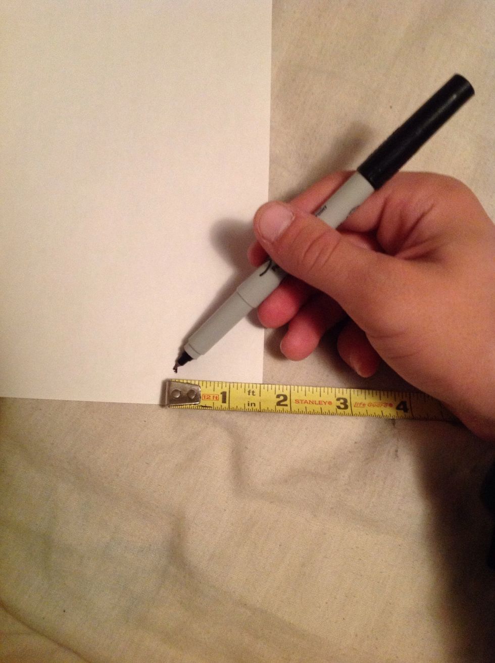 Measure about and inch and a half and mark it.