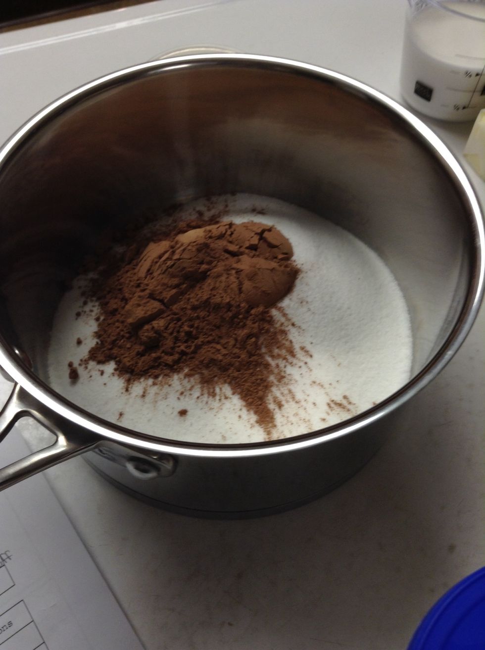 Measure all dry ingredients.     2 cups of sugar.  3 or 4 tbsp of Hershey's cocoa.